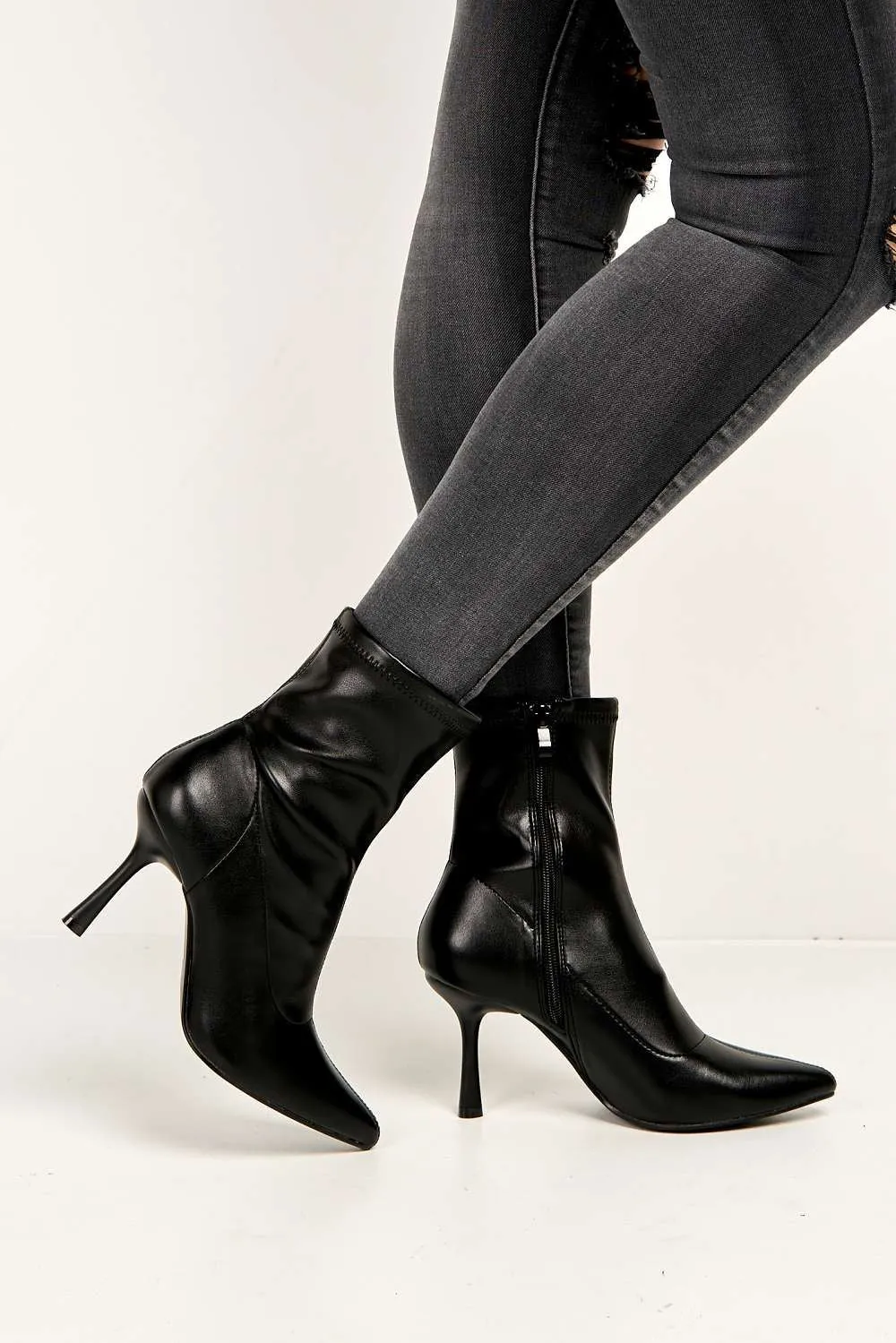 Aayat Pointed Toe Heeled Boots in Black